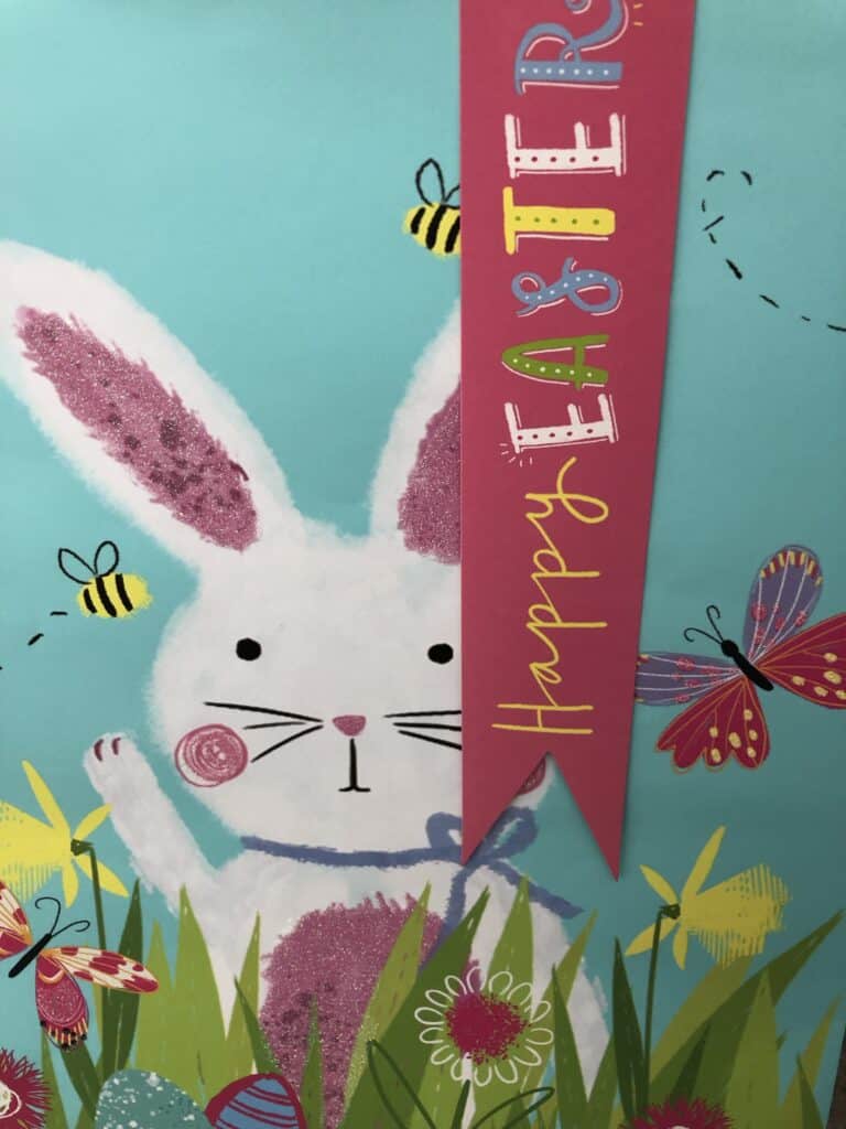 a drawing of a bunny with the words happy easter