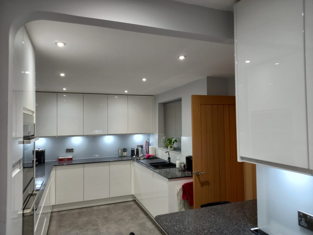 small kitchen example with gloss cabinets