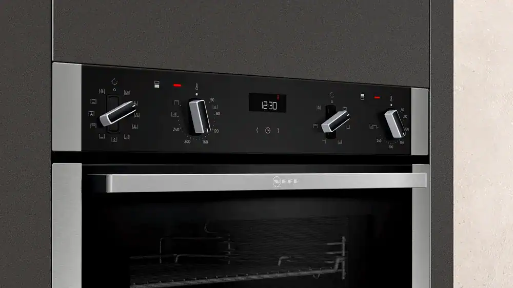 a close up image of the controls on a neff oven