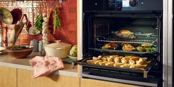 a neff oven with food cooking the door is open