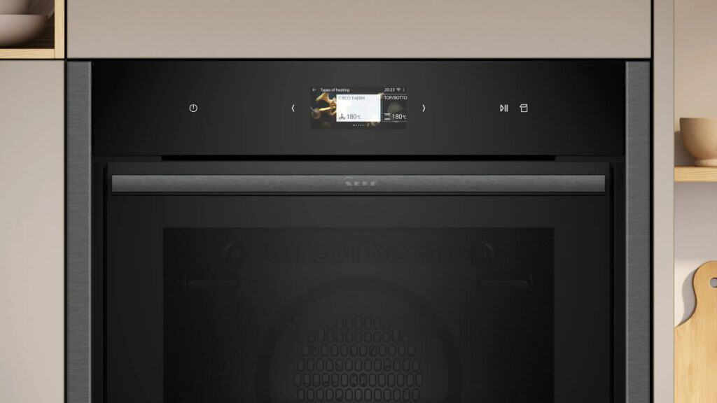 a close up picture of a neff slide and hide oven